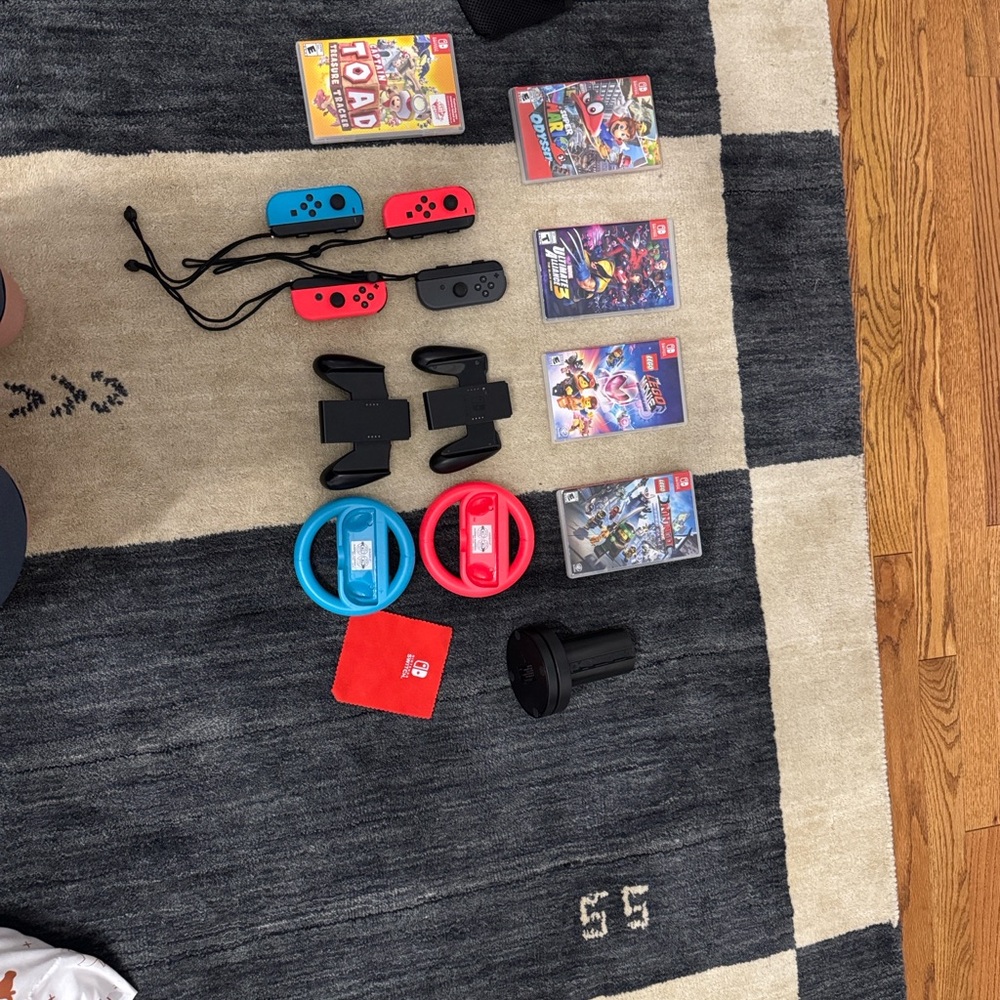 Nintendo Switch Joy-Con Controllers, games, accessories, and charging dock